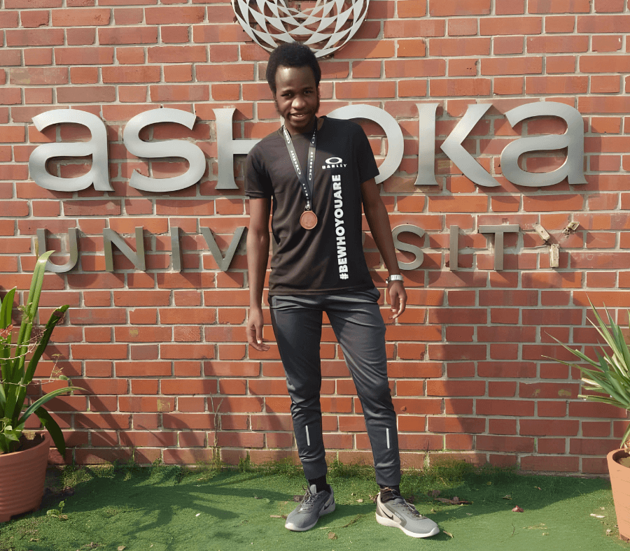 Blessed pictured in front of Ashoka University entrance